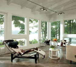 Marvin – Interior Porch featuring Ultimate Sliding French Door and Awning Narrow Frame Painted White.