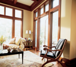 Marvin – Interior Living Room featuring Swinging French Door in Stained Pine with Transom