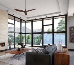 WINDOWS: Marvin – Interior Living Room featuring Ultimate Narrow Frame Corner in Designer Black Painted I nterior Finish.