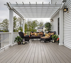 AZEK Decking & Railing Arbor Collection Silveroak Composite Decking With Premier White Composite Lighting 5.5″ Post Sleeve and Post Cap